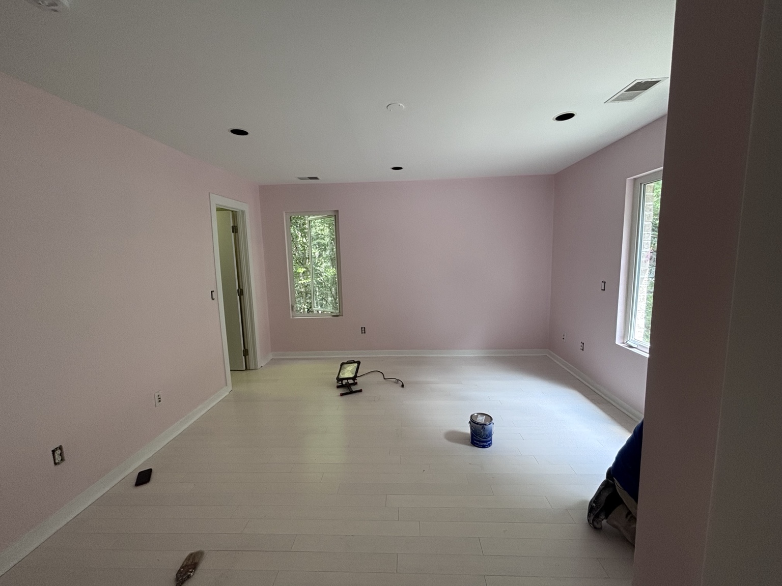 Pink room painting and white flooring